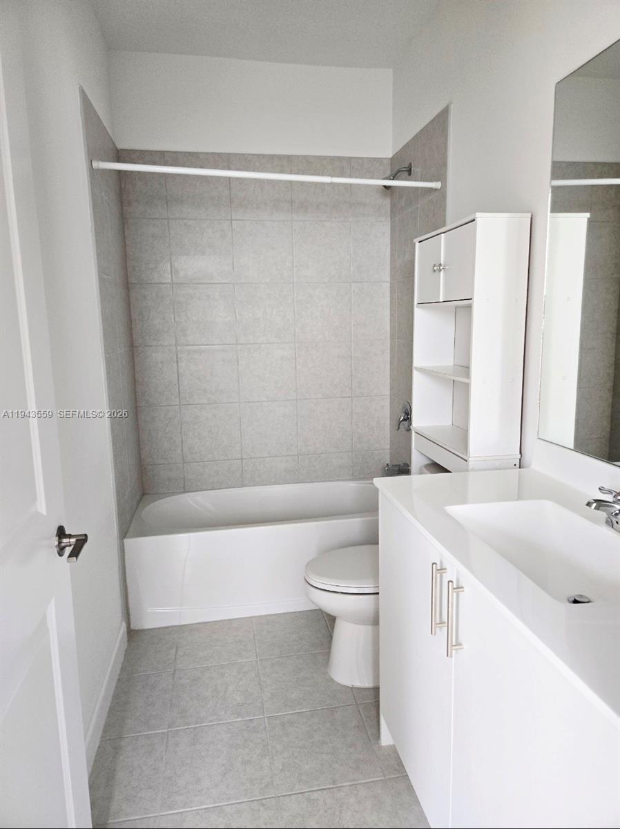 17925 Southwest 358th Street Homestead, FL 33034 - Photo 12 of 25 a bathroom with a sink toilet and shower