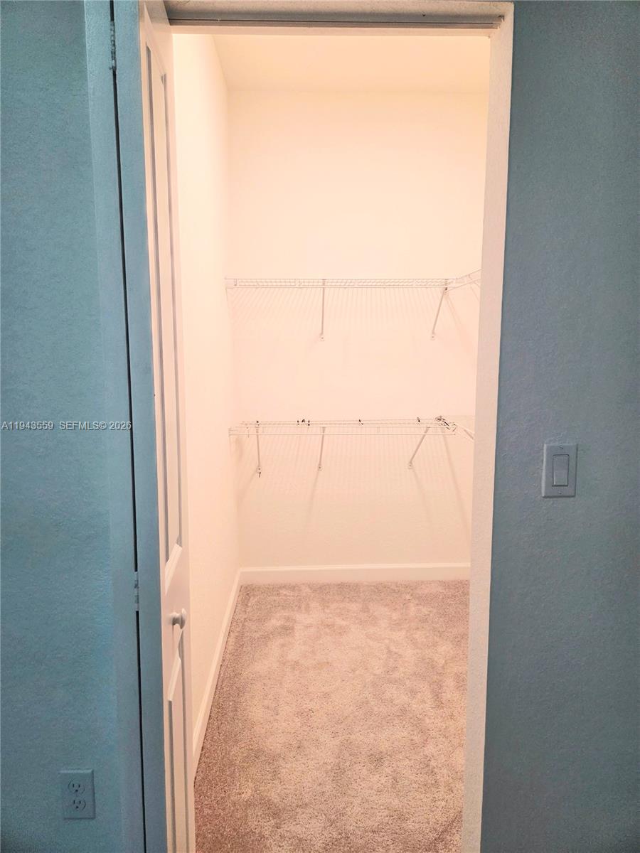 17925 Southwest 358th Street Homestead, FL 33034 - Photo 19 of 25 an empty room with a window