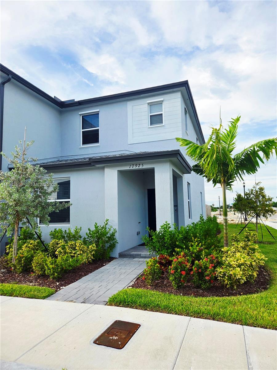 17925 Southwest 358th Street Homestead, FL 33034 - Photo 2 of 25 a front view of house with yard