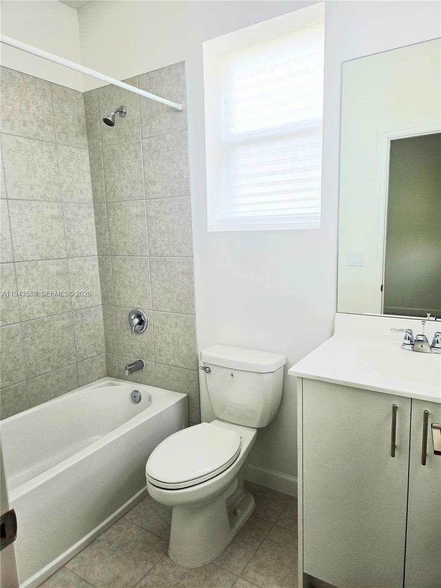 17925 Southwest 358th Street Homestead, FL 33034 - Photo 25 of 25 a bathroom with a sink a toilet and a bathtub
