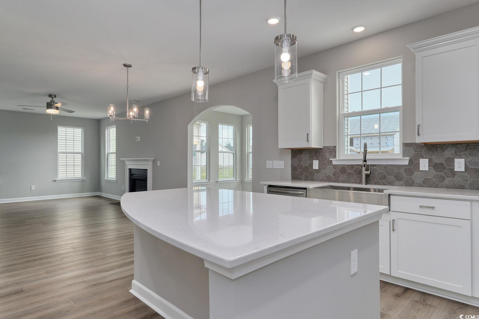 4035 Bucolic Loop Myrtle Beach, SC 29588 - Photo 6 of 39 Kitchen with light wood-type flooring, a ceiling f