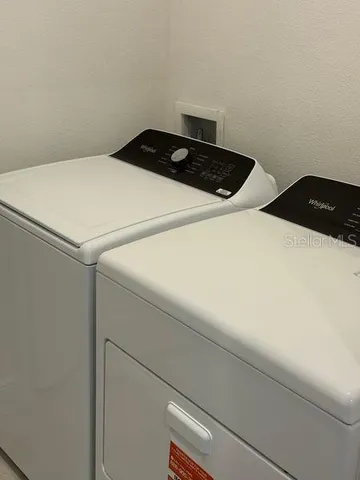 a house that has garden in front of it