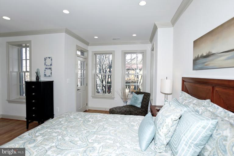 18 7th Street Northeast Washington, DC 20002 - Photo 15 of 27 a bedroom with a bed and a large window