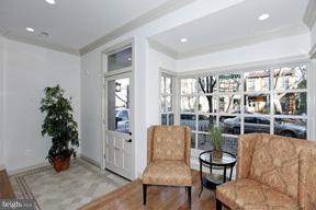 18 7th Street Northeast Washington, DC 20002 - Photo 6 of 27 a living room with furniture and potted plants