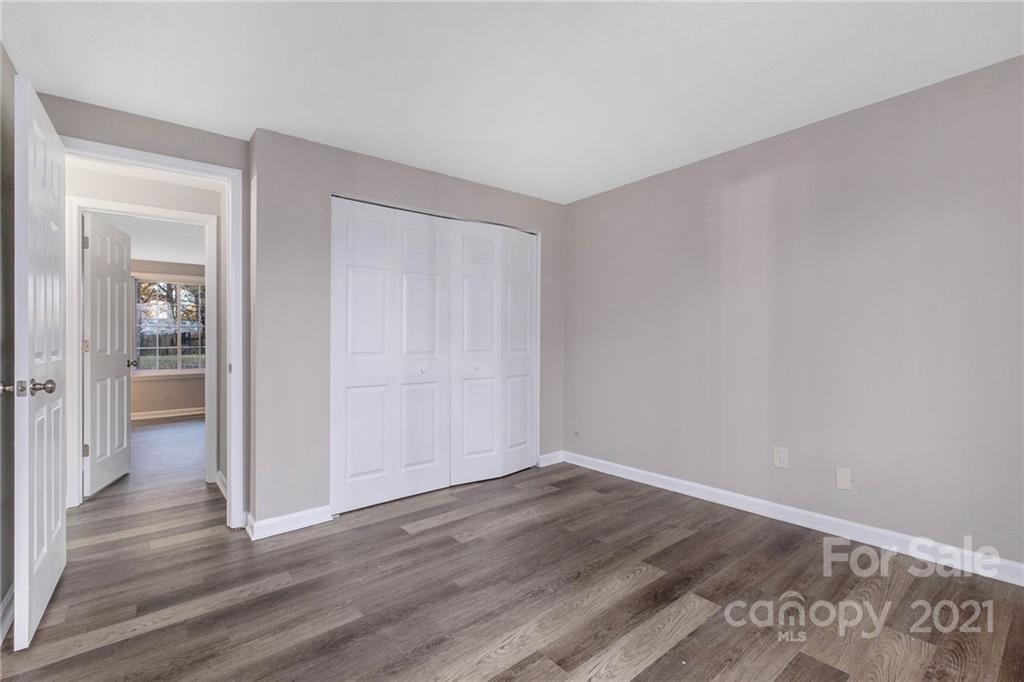 6217 Hickory Ridge Lane Charlotte, NC 28227 - Photo 13 of 15 wooden floor in an empty room