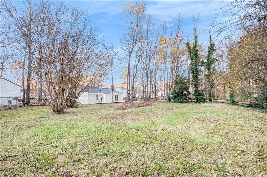 6217 Hickory Ridge Lane Charlotte, NC 28227 - Photo 14 of 15 a view of a yard with a trees