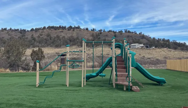 a view of a house with a park