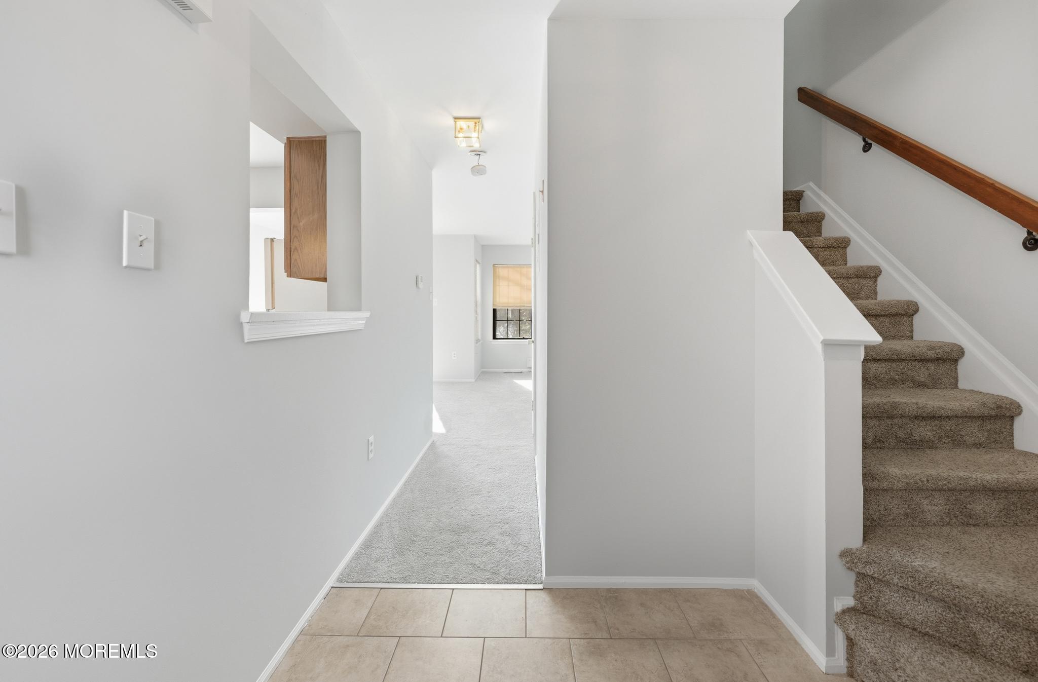 2305 Gulfstream Way Toms River, NJ 08755 - Photo 6 of 42 a view of entryway and hall with a window