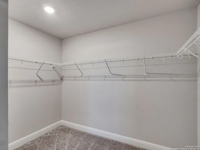 a view of a room with racks on the wall