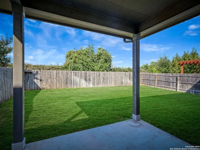 a view of a backyard with a garden