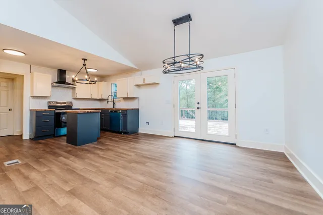 a view of small space with wooden floor