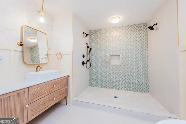 a room with a bench and a window