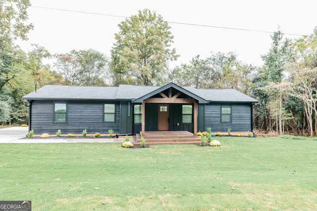 front view of house with a yard
