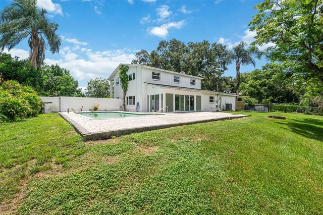 a view of a house with a big yard