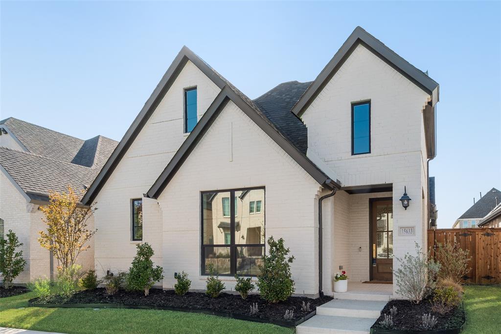 15633 Fringe Tree Road Frisco, TX 75035 - Photo 1 of 1 a front view of a house with garden