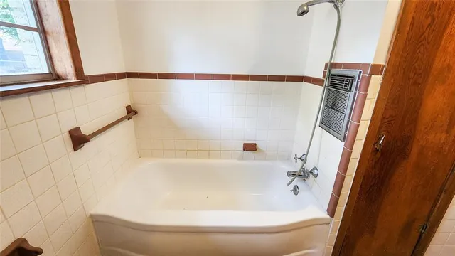 a bathroom with a bathtub