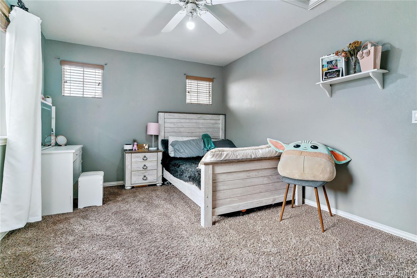 3477 Softwind Point Castle Rock, CO 80108 - Photo 28 of 50 a living room with furniture and a window