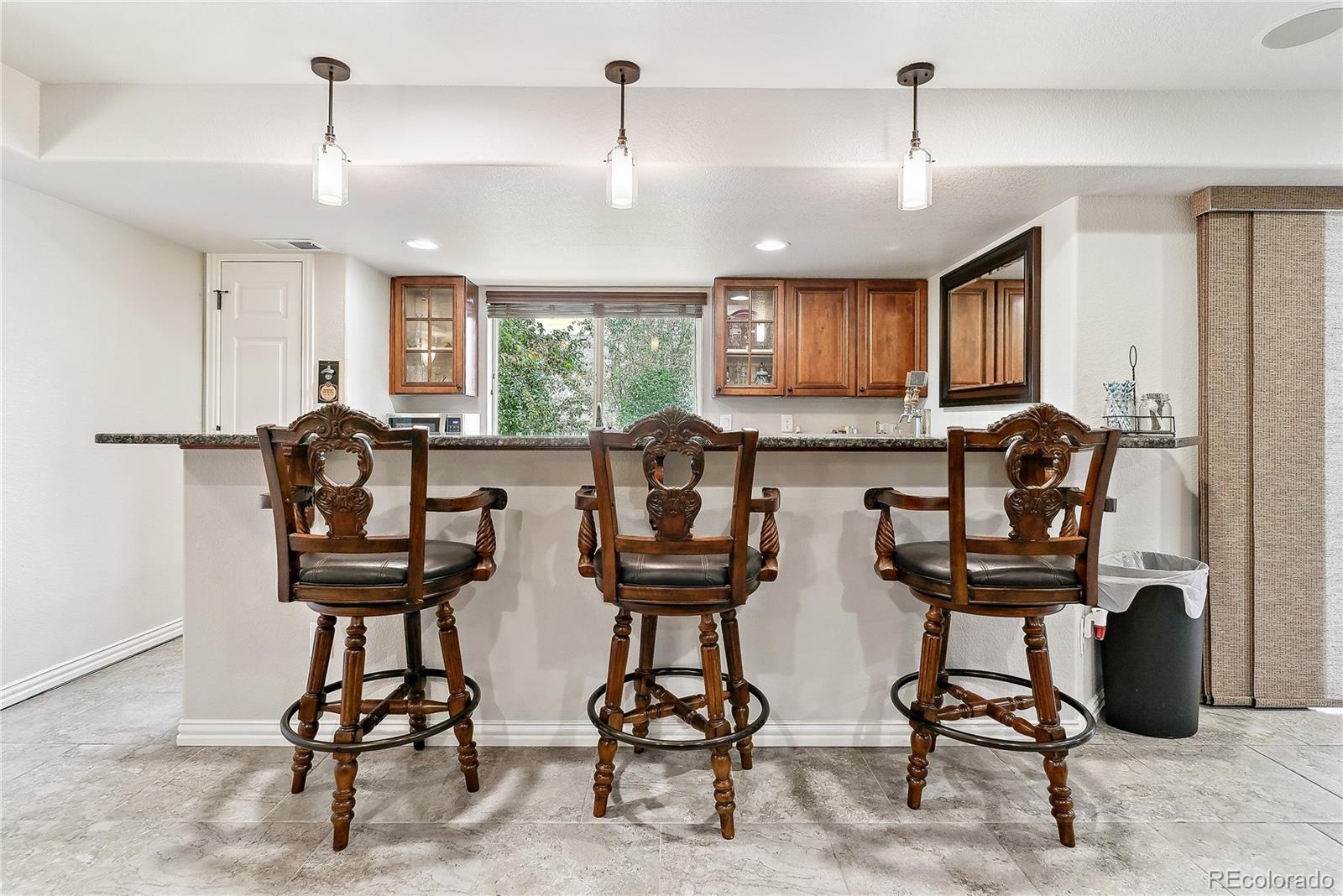 3477 Softwind Point Castle Rock, CO 80108 - Photo 39 of 50 a view of a room with gym equipment