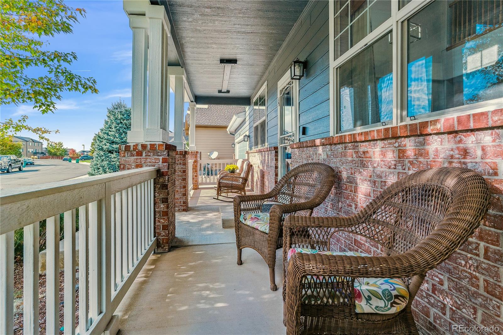 3477 Softwind Point Castle Rock, CO 80108 - Photo 4 of 50 a view of a chairs and bench in the balcony