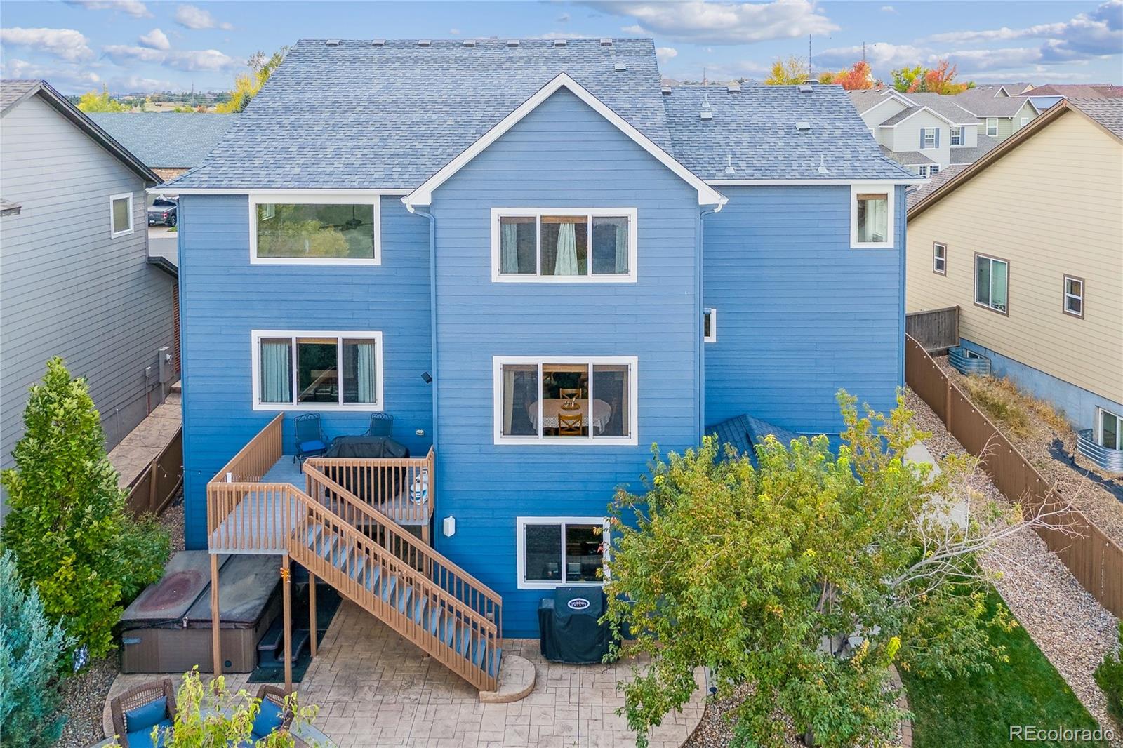 3477 Softwind Point Castle Rock, CO 80108 - Photo 48 of 50 a front view of a house with a yard