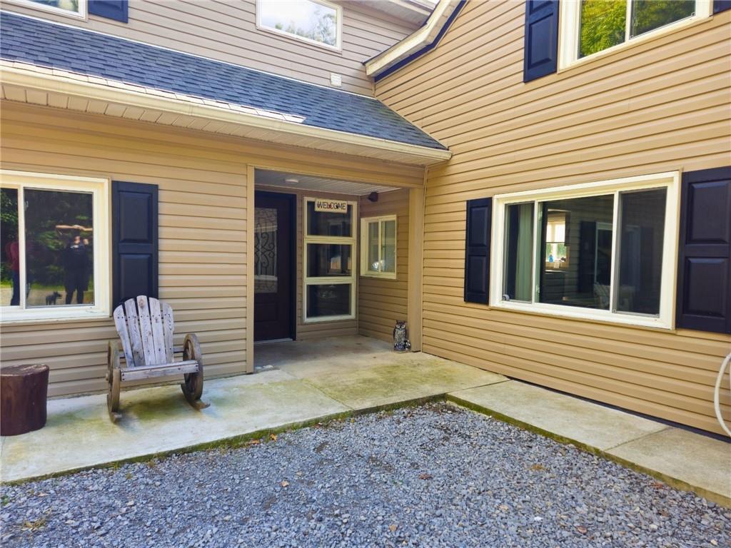 1088 Burns Road Kennerdell, PA 16374 - Photo 2 of 49 a view of a house with backyard and sitting area