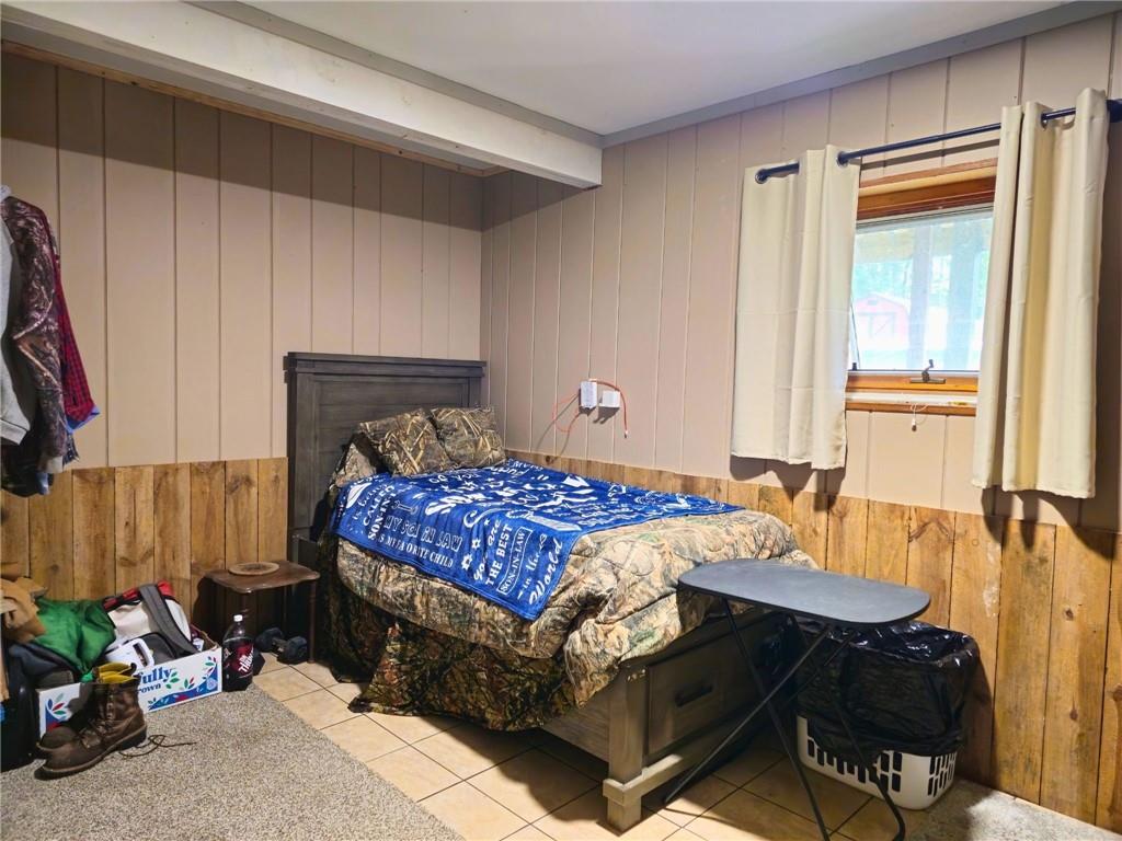 1088 Burns Road Kennerdell, PA 16374 - Photo 21 of 49 a bedroom with a bed and a table