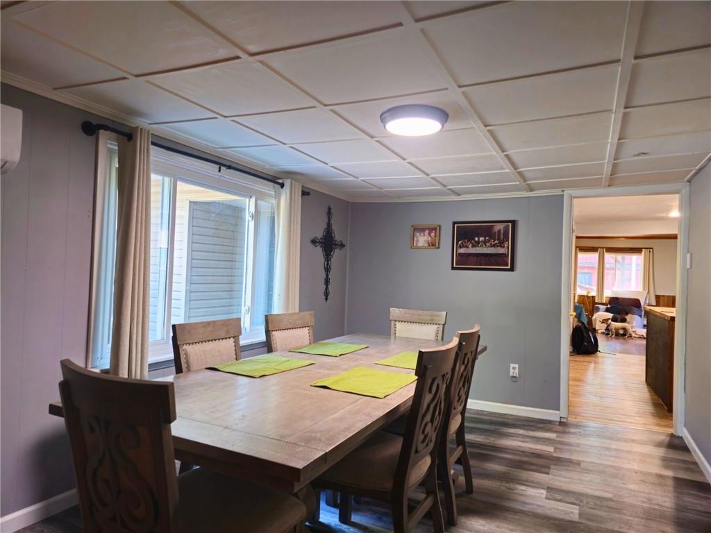 1088 Burns Road Kennerdell, PA 16374 - Photo 22 of 49 a dining room with furniture window and wooden floor