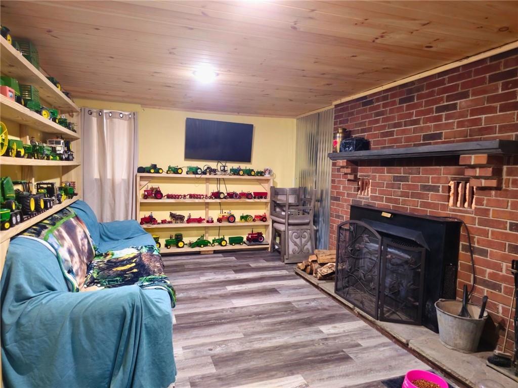 1088 Burns Road Kennerdell, PA 16374 - Photo 25 of 49 a living room with furniture and a fireplace