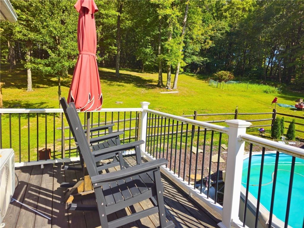 1088 Burns Road Kennerdell, PA 16374 - Photo 31 of 49 a view of a wooden deck with chairs