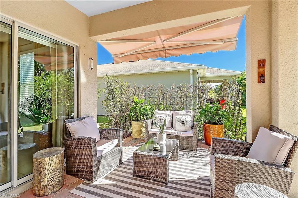 690 Hadley Place East Naples, FL 34104 - Photo 21 of 27 a view of a patio on the deck
