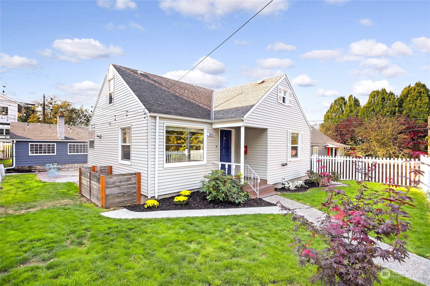365 Northwest 47th Street Seattle, WA 98107 - Photo 1 of 31 a front view of house with yard and outdoor seating