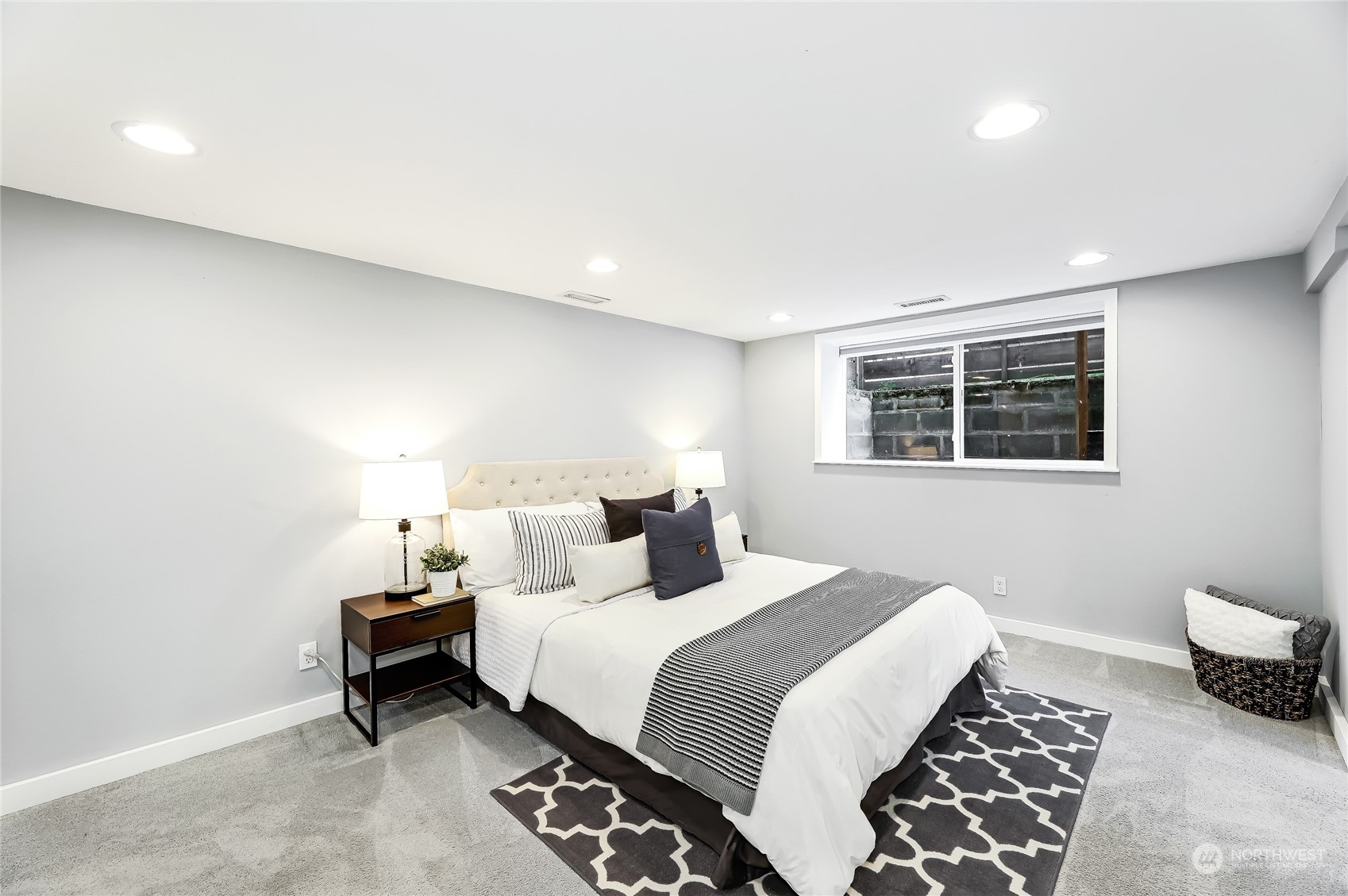 365 Northwest 47th Street Seattle, WA 98107 - Photo 11 of 31 a bedroom with a bed and a window