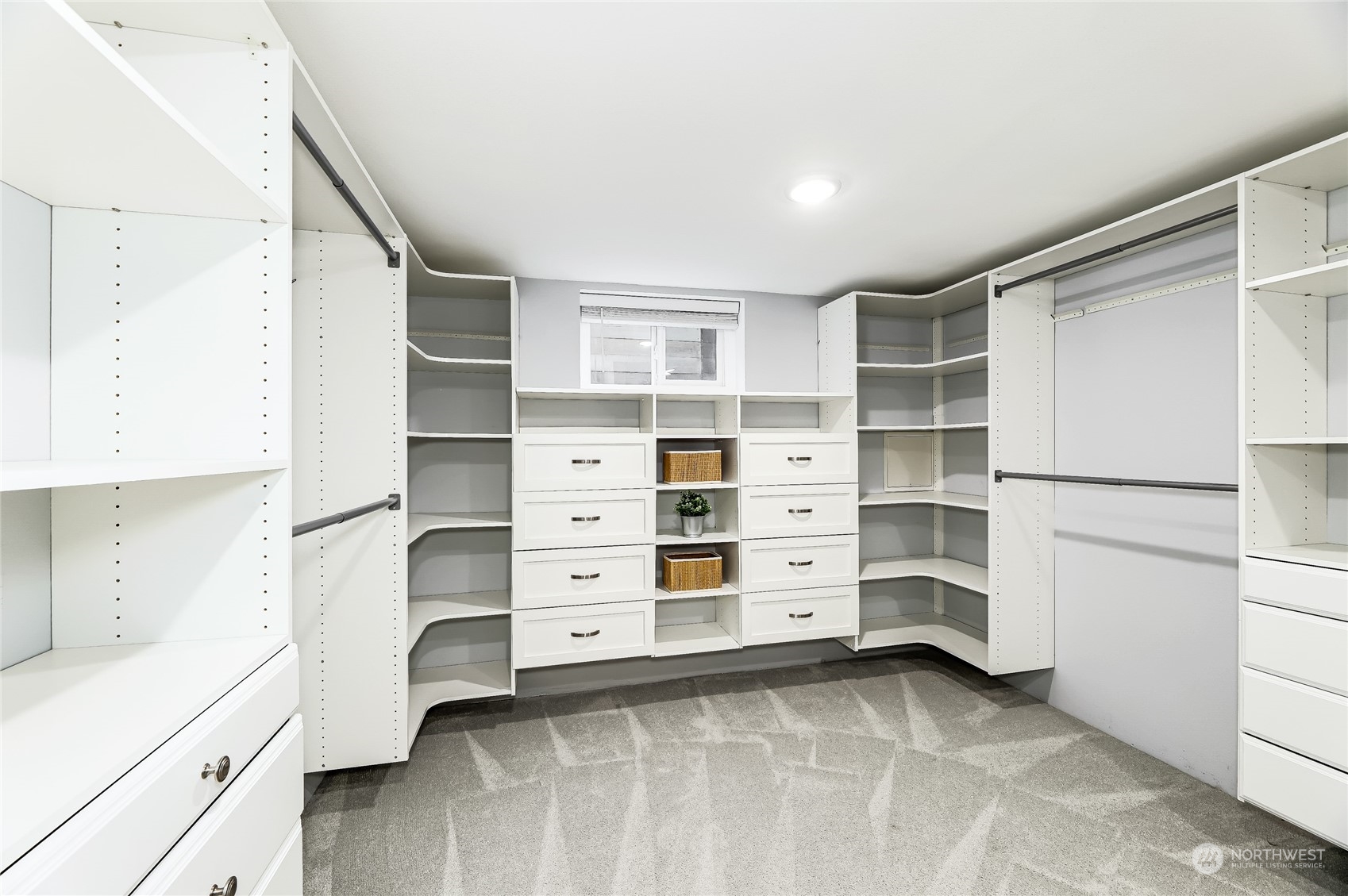 365 Northwest 47th Street Seattle, WA 98107 - Photo 14 of 31 a view of walk in closet with clothes and shoes