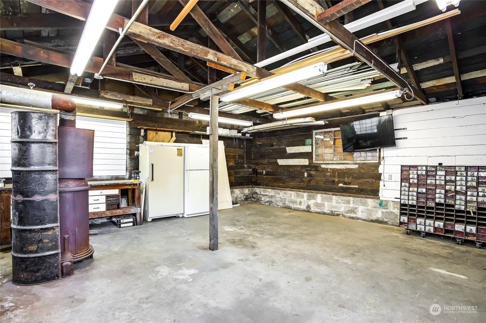 365 Northwest 47th Street Seattle, WA 98107 - Photo 24 of 31 a view of empty room with wooden ceiling