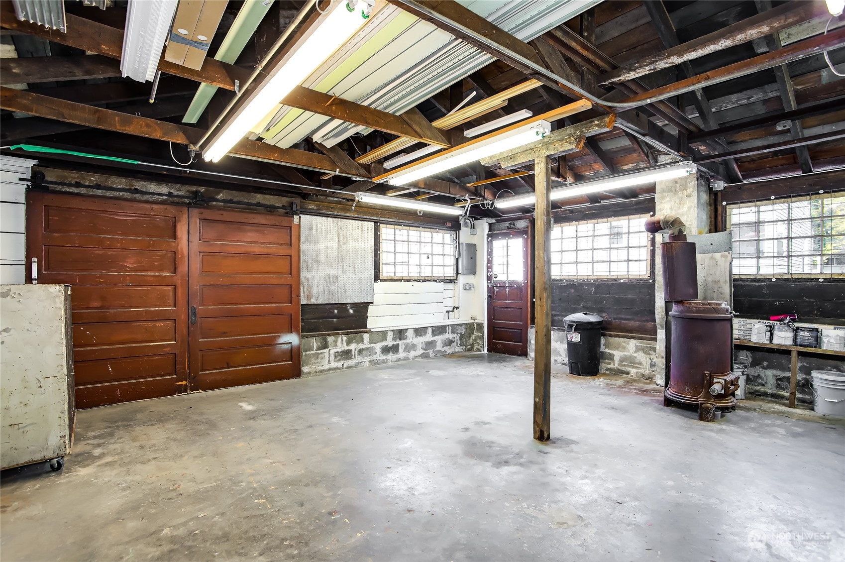 365 Northwest 47th Street Seattle, WA 98107 - Photo 25 of 31 a view of empty room with wooden ceiling