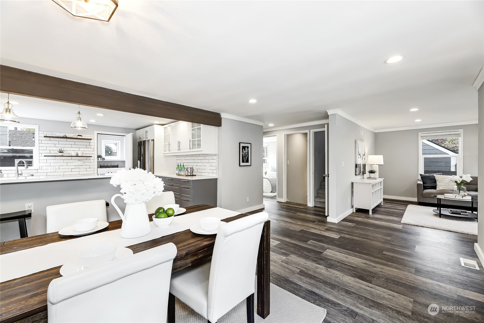 365 Northwest 47th Street Seattle, WA 98107 - Photo 9 of 31 a living room with stainless steel appliances kitchen island granite countertop furniture and a kitchen view