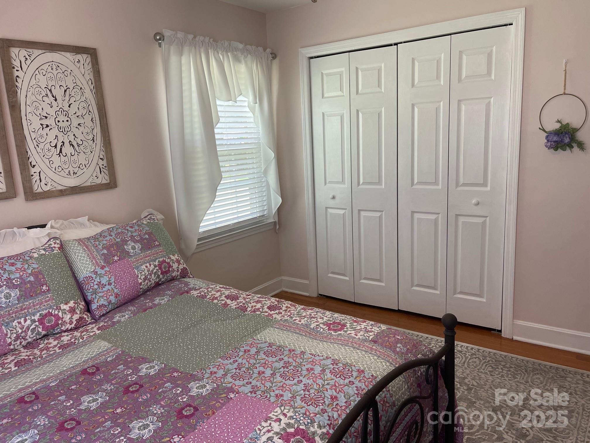 107 Calhoun Drive Cheraw, SC 29520 - Photo 16 of 16 a bedroom with a bed and a window