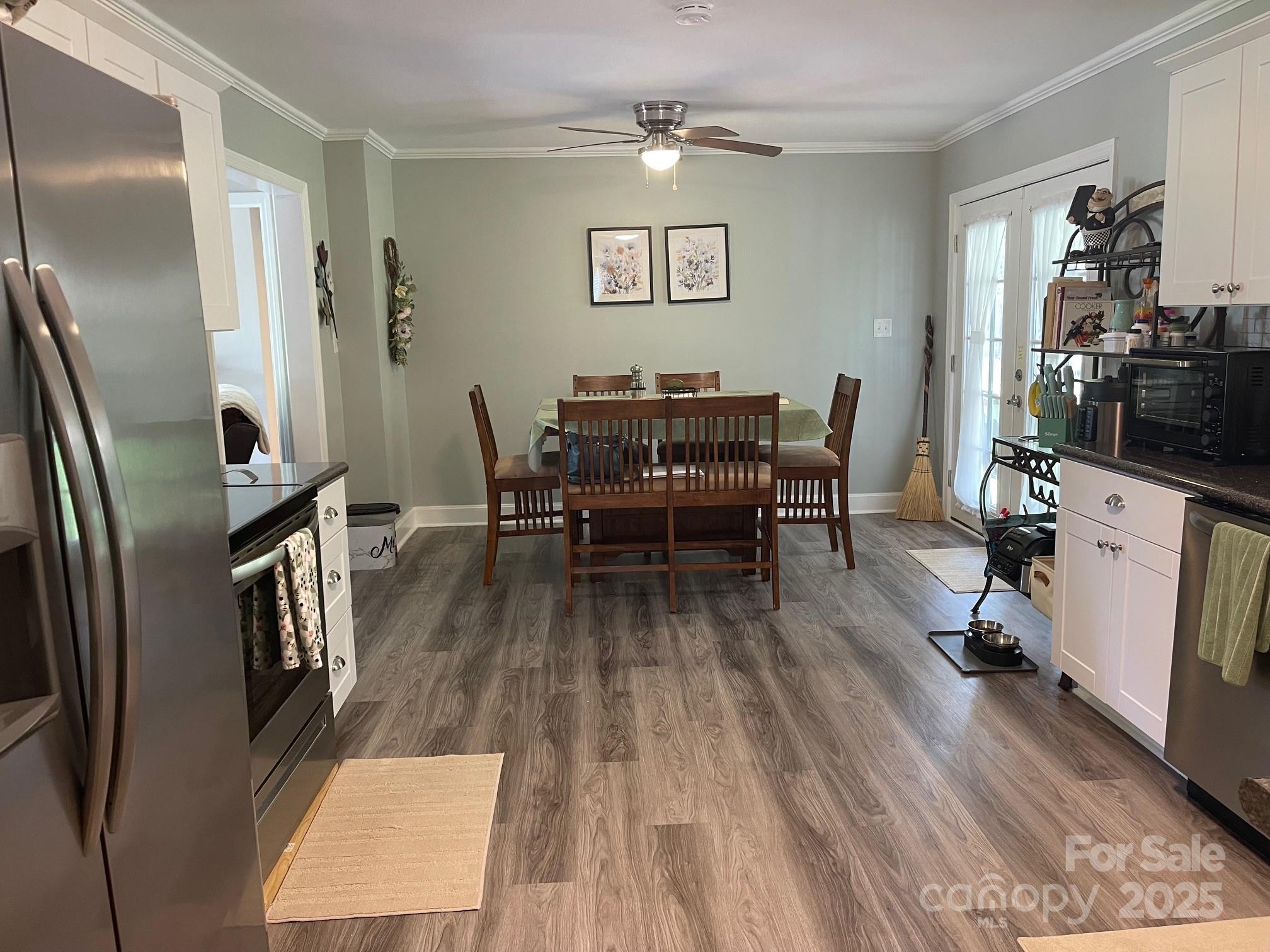 107 Calhoun Drive Cheraw, SC 29520 - Photo 6 of 16 a view of a livingroom with furniture and a flat screen tv