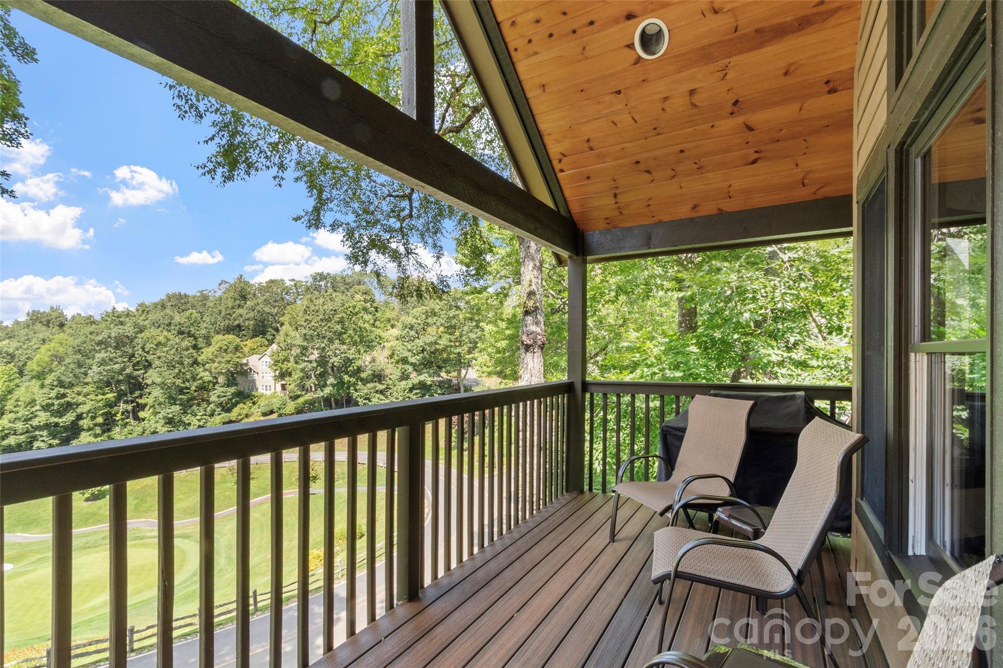 91 Brandy Run Road Burnsville, NC 28714 - Photo 14 of 45 a view of a two chair in the balcony
