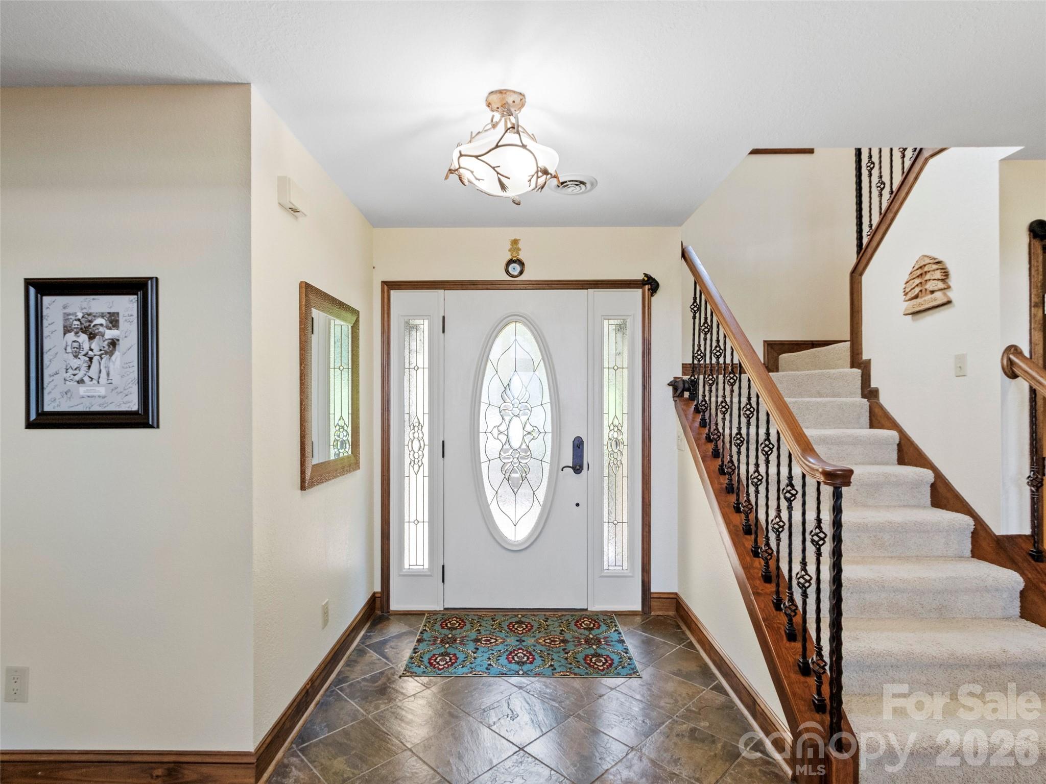 91 Brandy Run Road Burnsville, NC 28714 - Photo 3 of 45 a view of an entryway with wooden floor