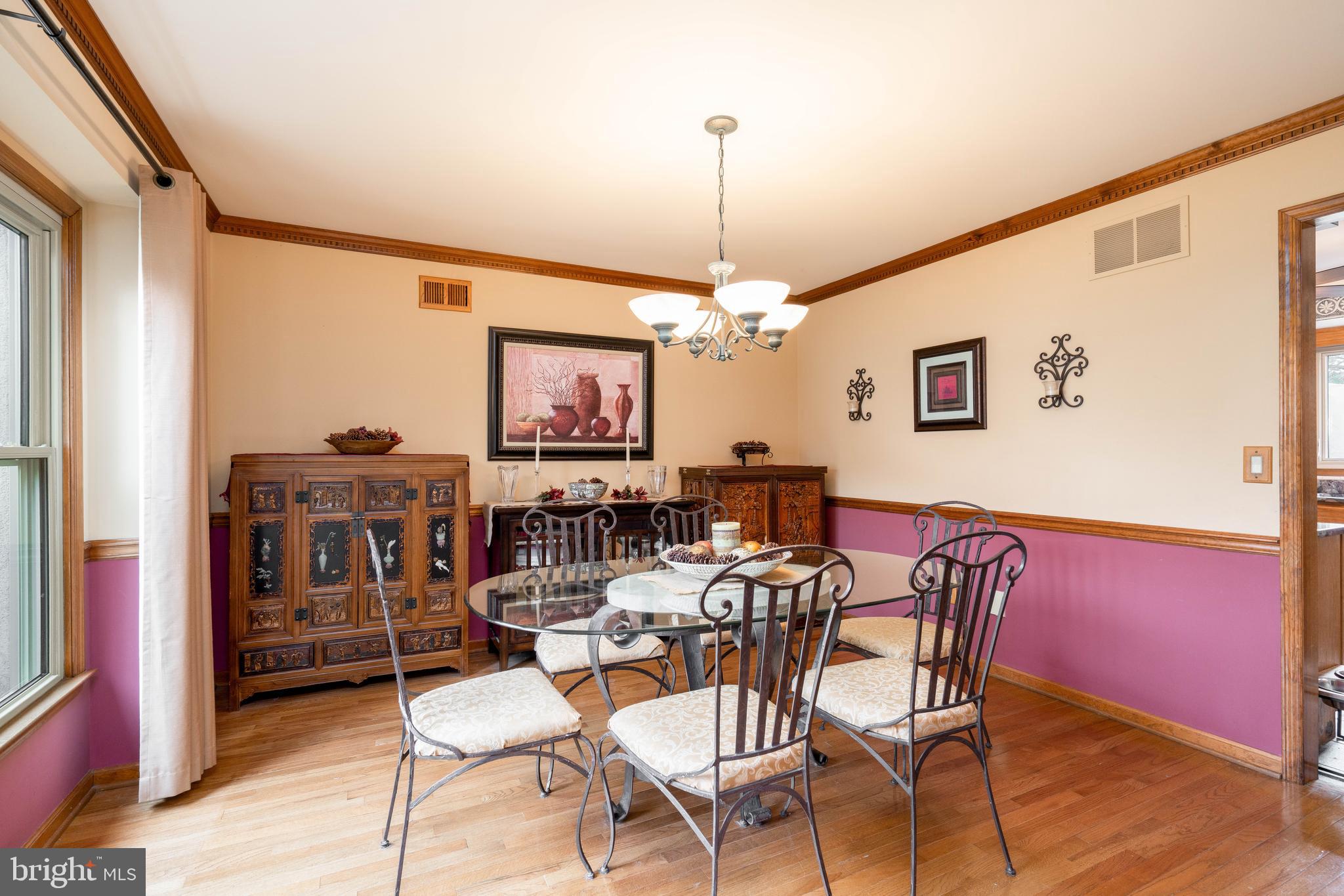 9 Timber Wolf Drive Hamilton, NJ 08620 - Photo 11 of 48 a view of a dining room with furniture and chandelier