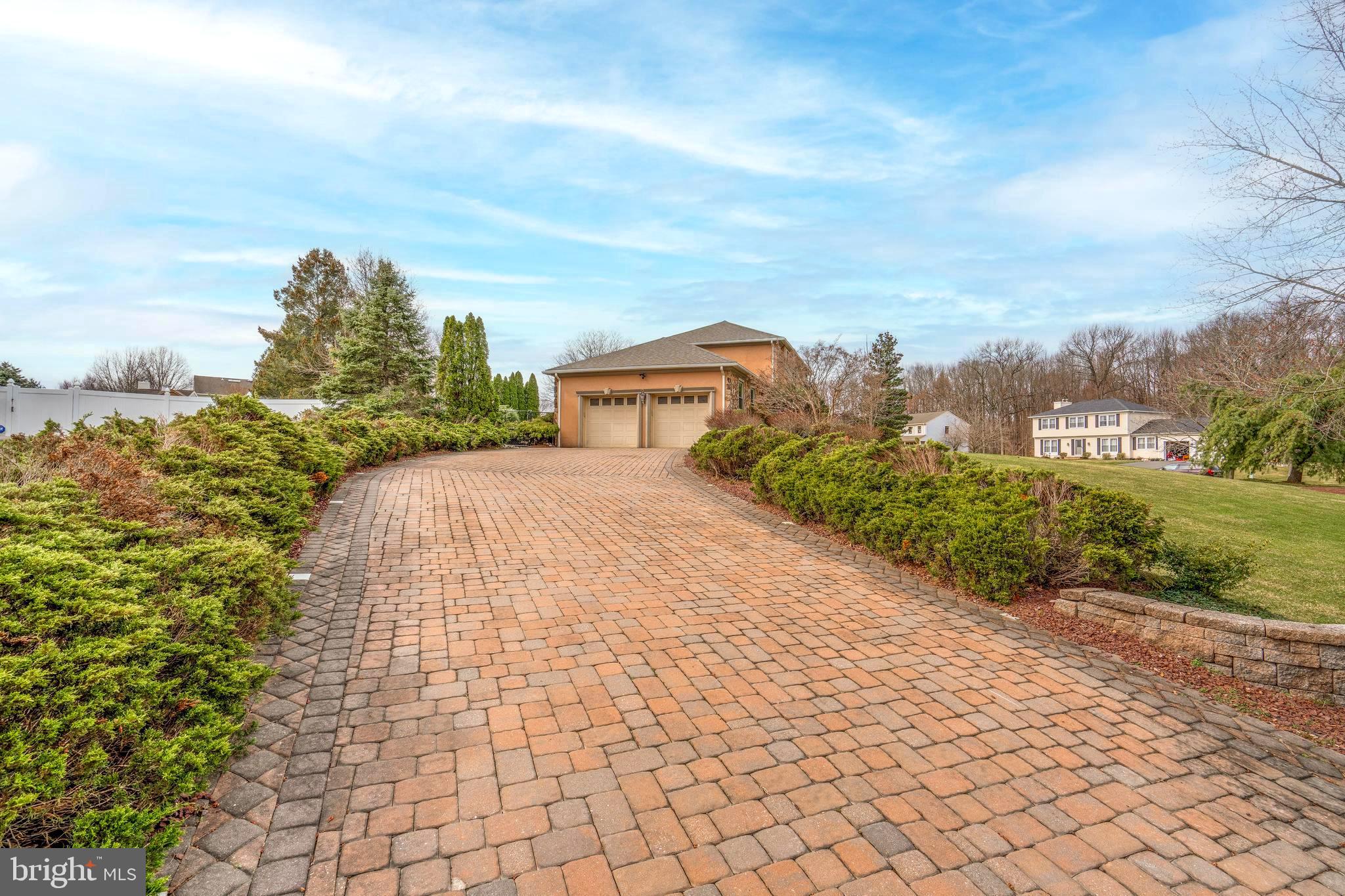 9 Timber Wolf Drive Hamilton, NJ 08620 - Photo 2 of 48 a view of a pathway both side of building
