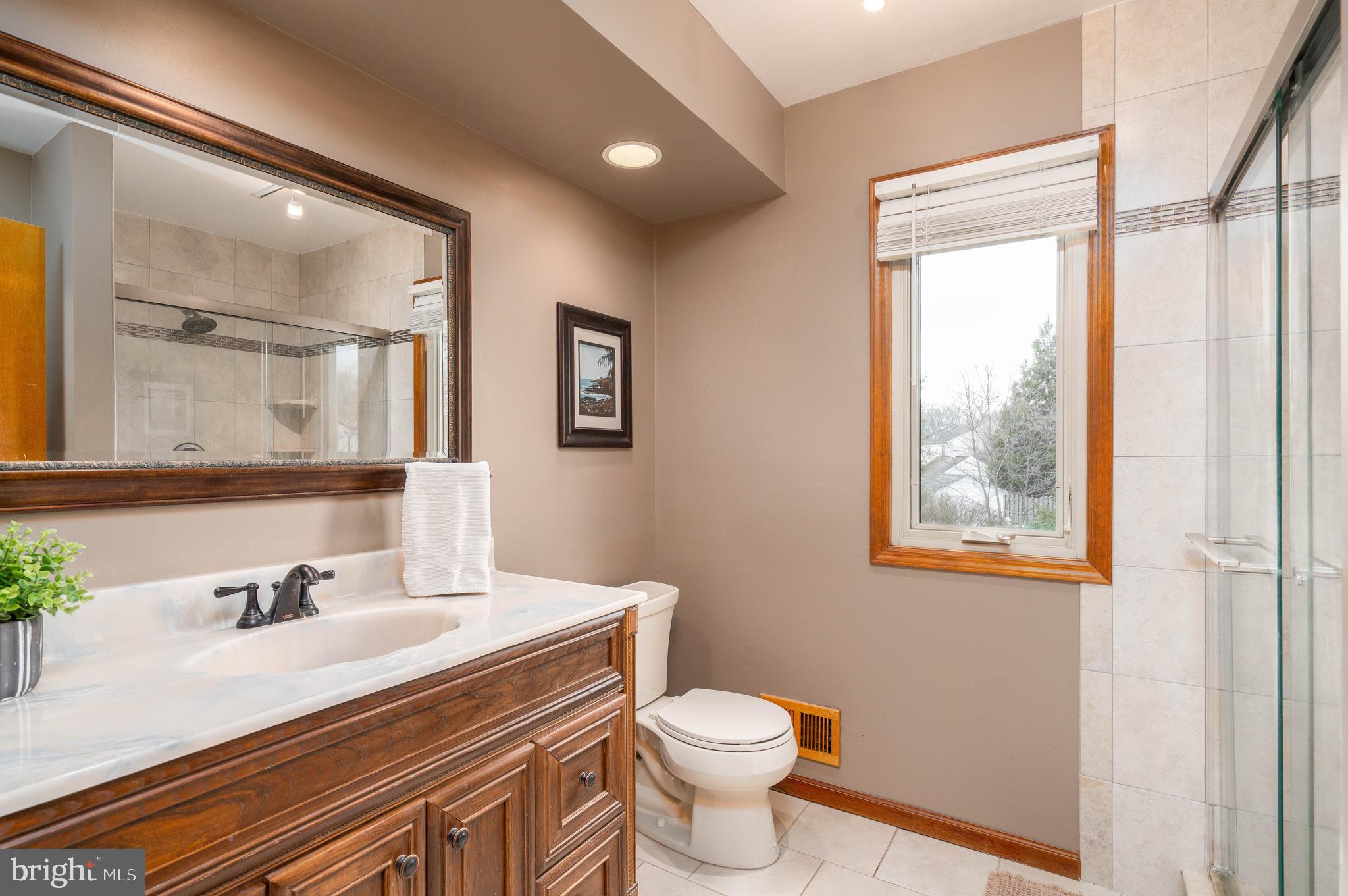 9 Timber Wolf Drive Hamilton, NJ 08620 - Photo 27 of 48 a bathroom with a sink vanity granite and toilet