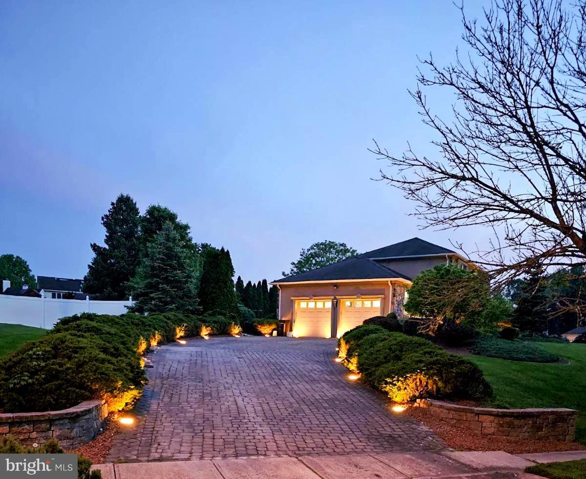 9 Timber Wolf Drive Hamilton, NJ 08620 - Photo 3 of 48 a front view of a house with garden space and street view