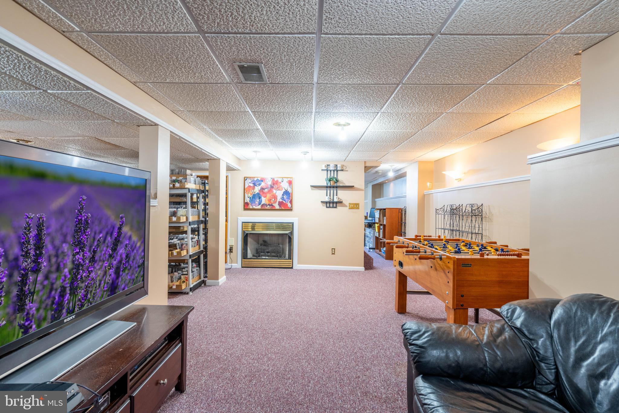 9 Timber Wolf Drive Hamilton, NJ 08620 - Photo 35 of 48 a living room with furniture and a flat screen tv