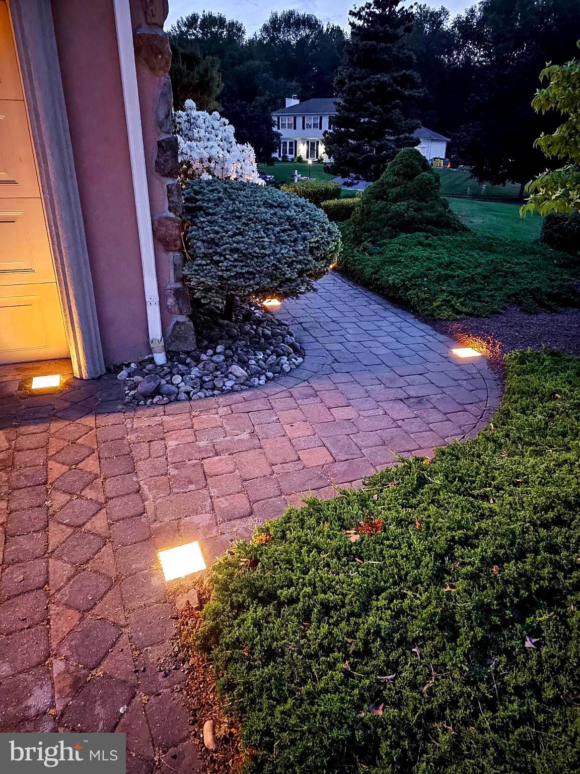 9 Timber Wolf Drive Hamilton, NJ 08620 - Photo 5 of 48 a view of a backyard with plants