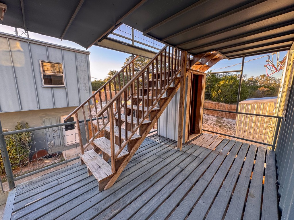 1050 Farm To Market Road 970, Unit B Florence, TX 76527 - Photo 19 of 26 a view of entryway with wooden floor