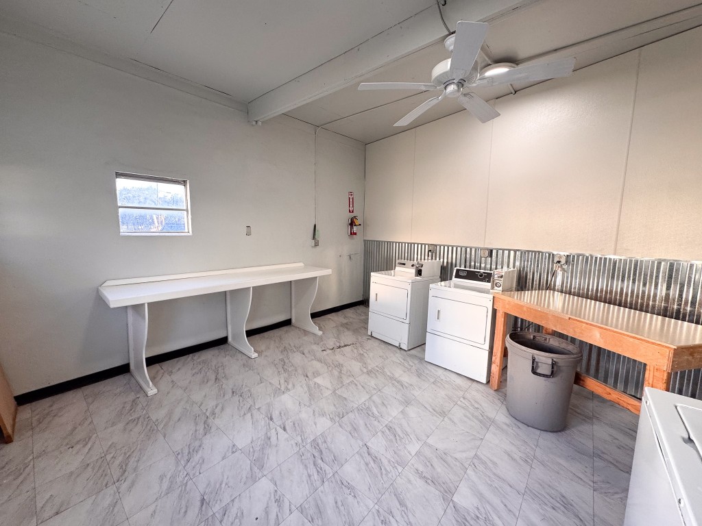 1050 Farm To Market Road 970, Unit B Florence, TX 76527 - Photo 23 of 26 a room with storage and utility