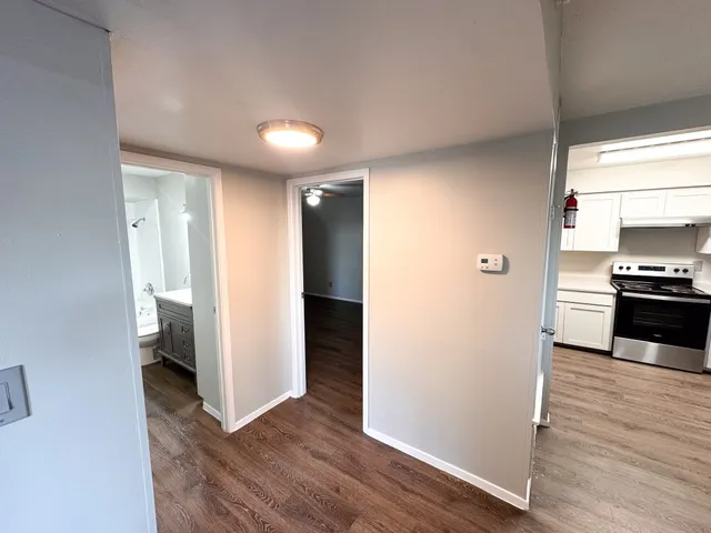a view of kitchen and wooden floor