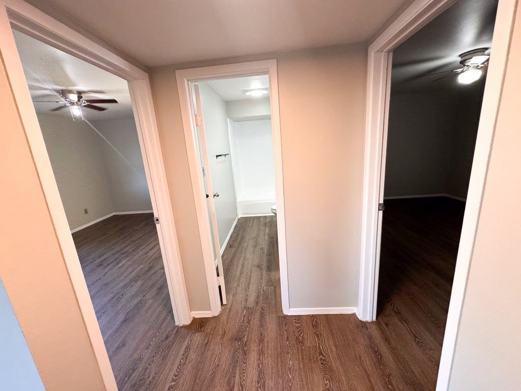 1050 Farm To Market Road 970, Unit B Florence, TX 76527 - Photo 8 of 26 wooden floor in a gallery